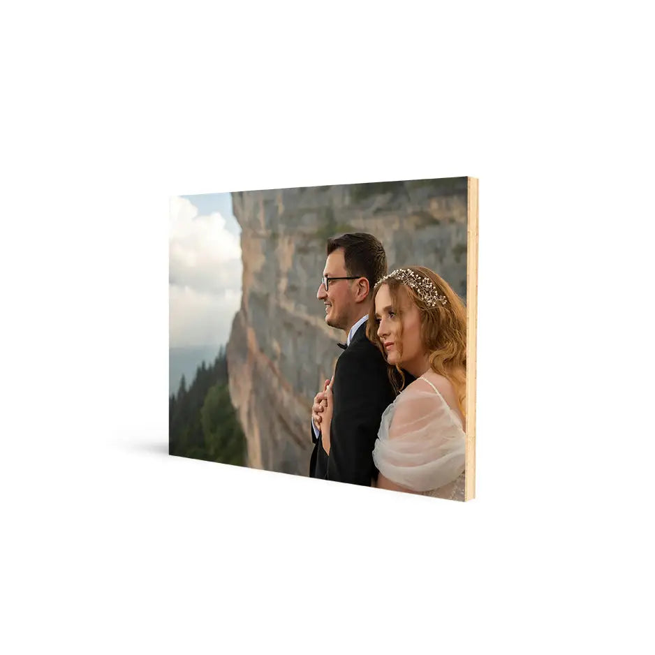 Bride and groom embrace on a mountain in a stunning Bamboo Wood Print