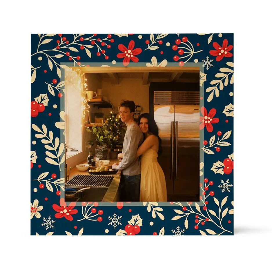 Framed photograph of a couple embracing in a kitchen with Birch Pattern Wood Print design