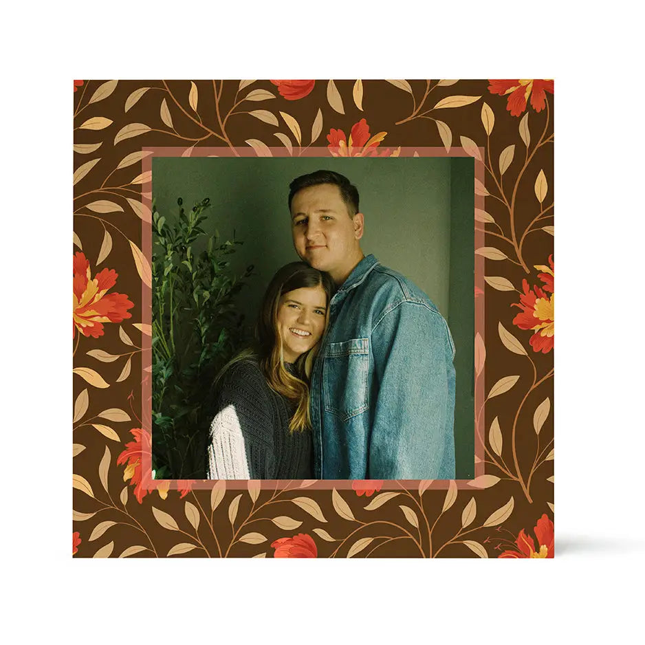 Framed photograph of a couple with Birch Pattern Wood and Fall Red Floral design