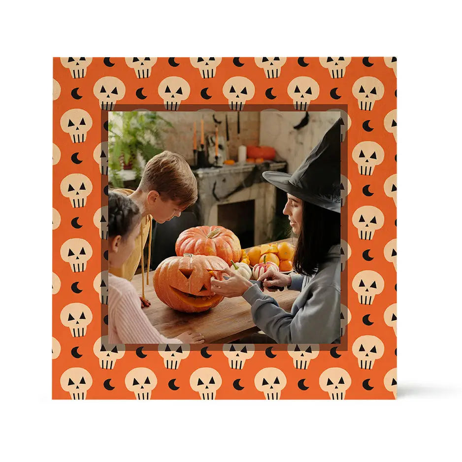 Children carving a Halloween pumpkin in a Birch Pattern Wood Print - Skull Moon frame