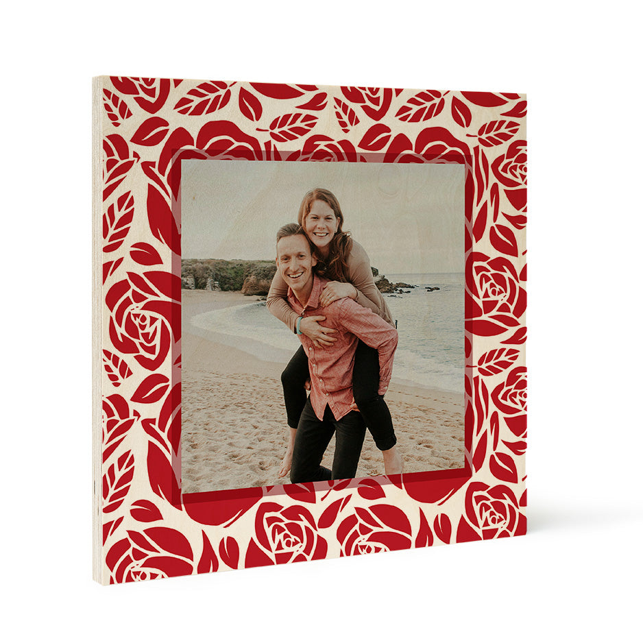 Photo frame featuring a red rose pattern border on a Birch Pattern Wood Print