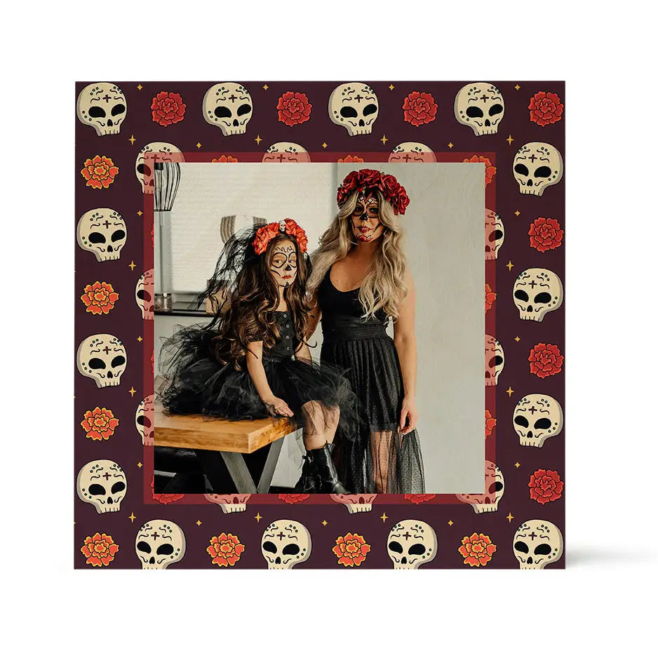 Framed photo locket of two women in Halloween costumes with Tagetes & Skulls design