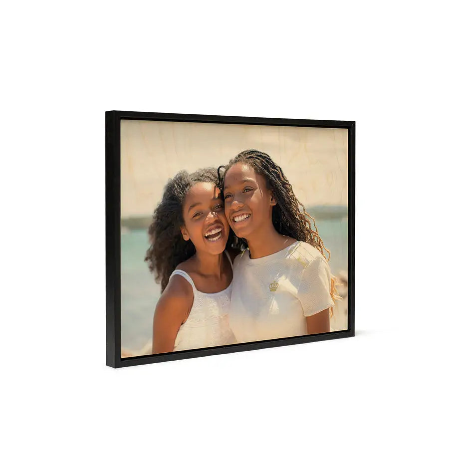 Black framed photo of two girls in a Birch Rectangle Black Frame with vintage matte finish