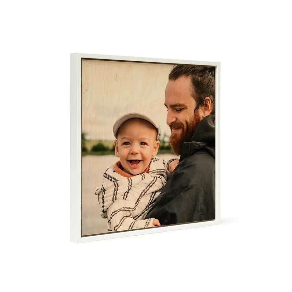 A man holding a baby in arms displayed in a Birch Square White Frame