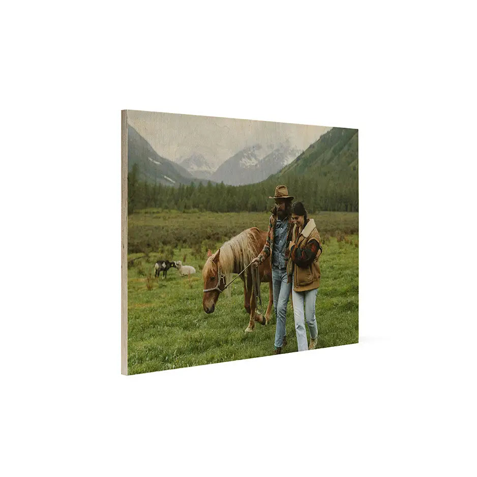 Canvas print of a rural mountain scene with people and a horse in Birch Vintage Matte Prints