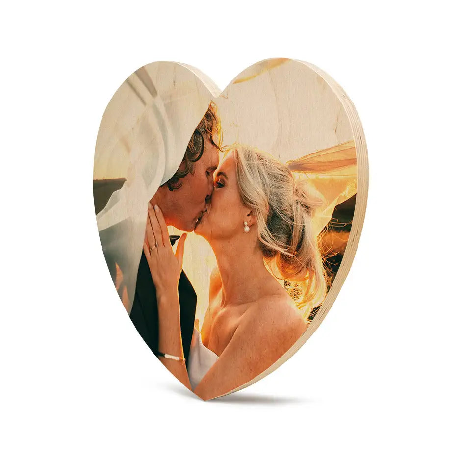 Heart-shaped photo frame of a couple kissing in Birch Vintage Matte Shape Prints