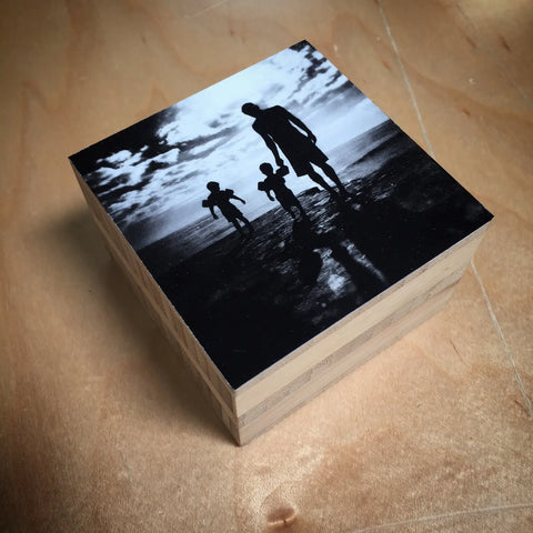 Black and white silhouette photo on eco-friendly bamboo photo block by WoodSnap