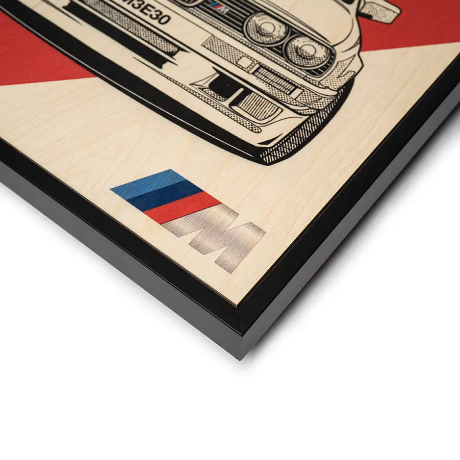 Framed BMW M3 E30 art print on wood featuring a sketch and BMW logo