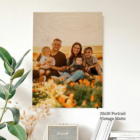 Canvas print of a family portrait in a sunny setting showcasing photo printing on wood.