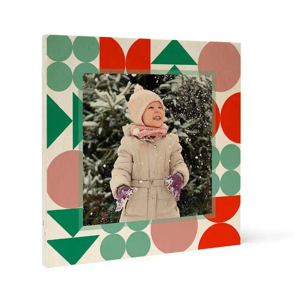 Colorful geometric wood print photo frame showcasing a winter scene in Woodsnap’s birch pattern.