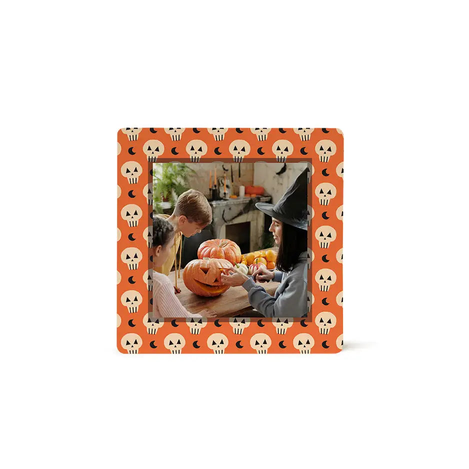 Halloween-themed photo tile pattern featuring skull moon and pumpkin carving