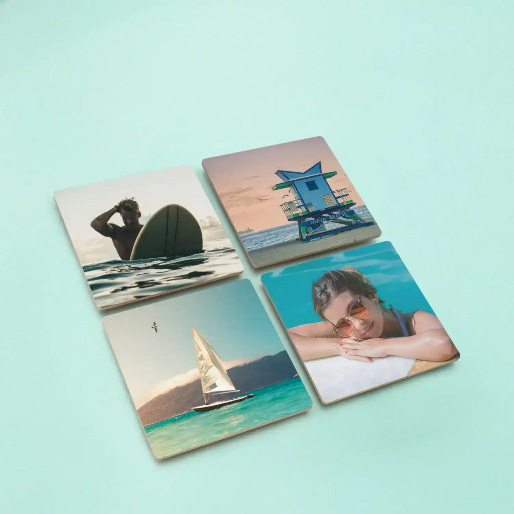 Gallery wall display with multiple MDF photo tiles showing family and travel photos
