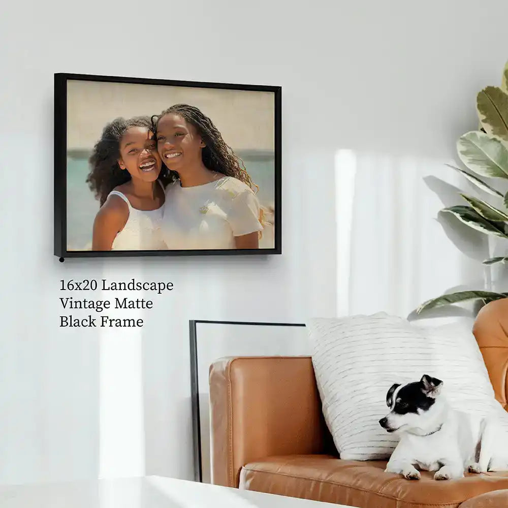 Framed wood print with black frame hanging in modern living room