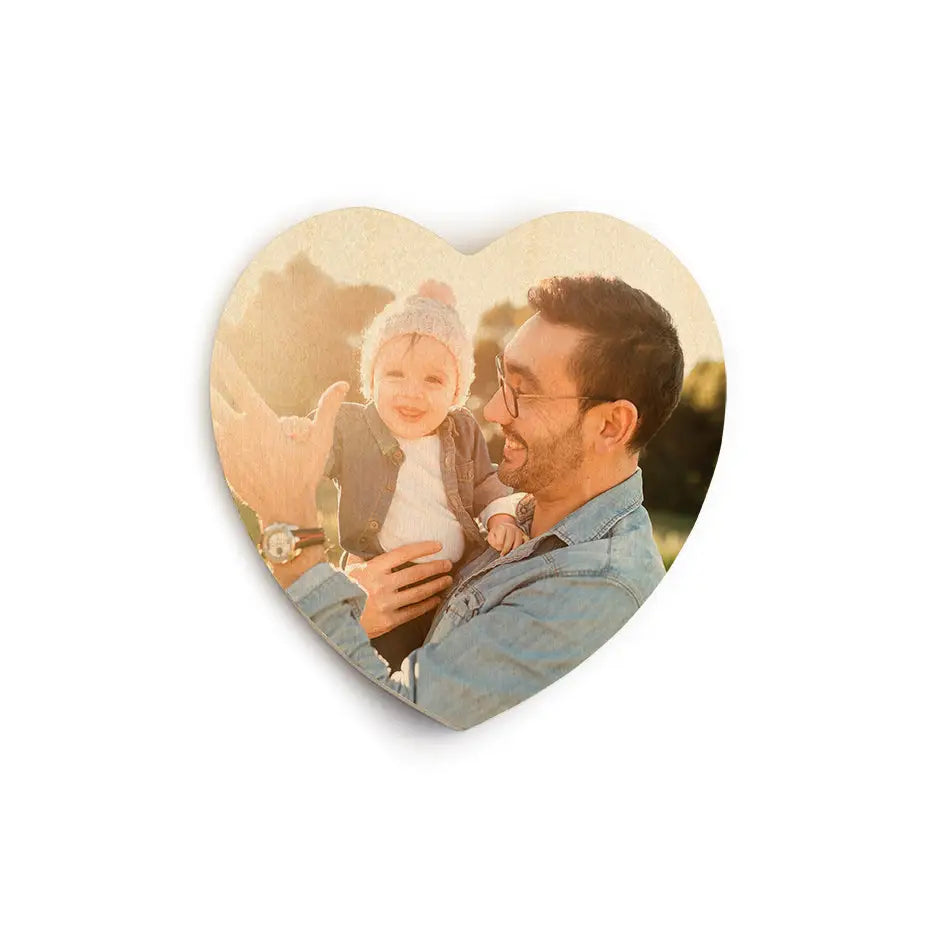 Man holds baby in heart-shaped photo for Heart Stash Box Print gift idea