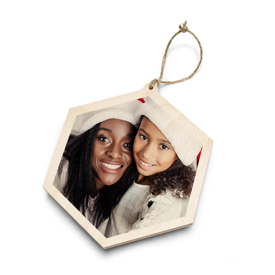 Hexagon wood ornament with photo locket and twine loop in burlap bag for gift decor