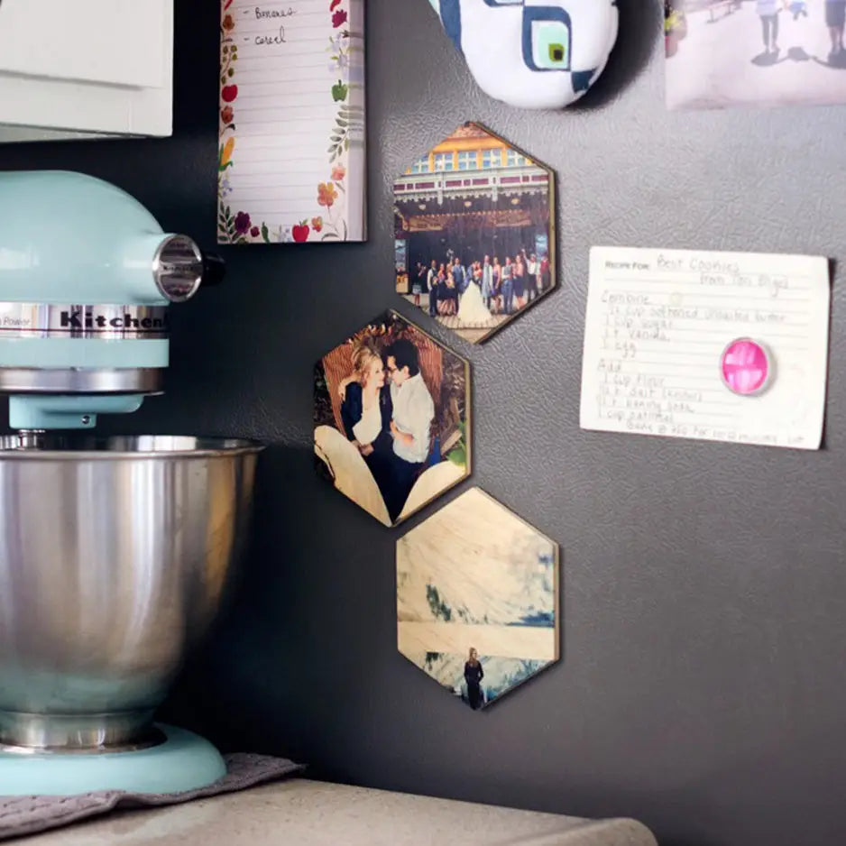 Kitchen wall showcasing a mixer and Hexagon Wood Print Magnet Set with photos