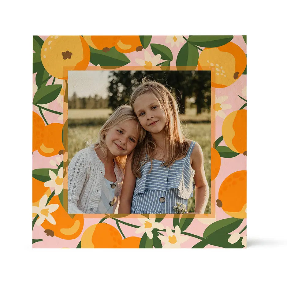 Square photo frame featuring vibrant orange fruit pattern in Birch Pattern Wood Print