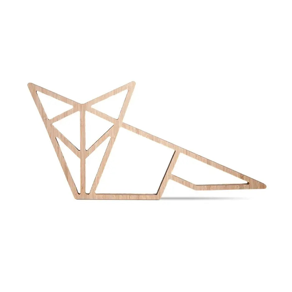Wooden sculpture of a bird atop Origami Fox Bamboo Wall Art for decorative flair