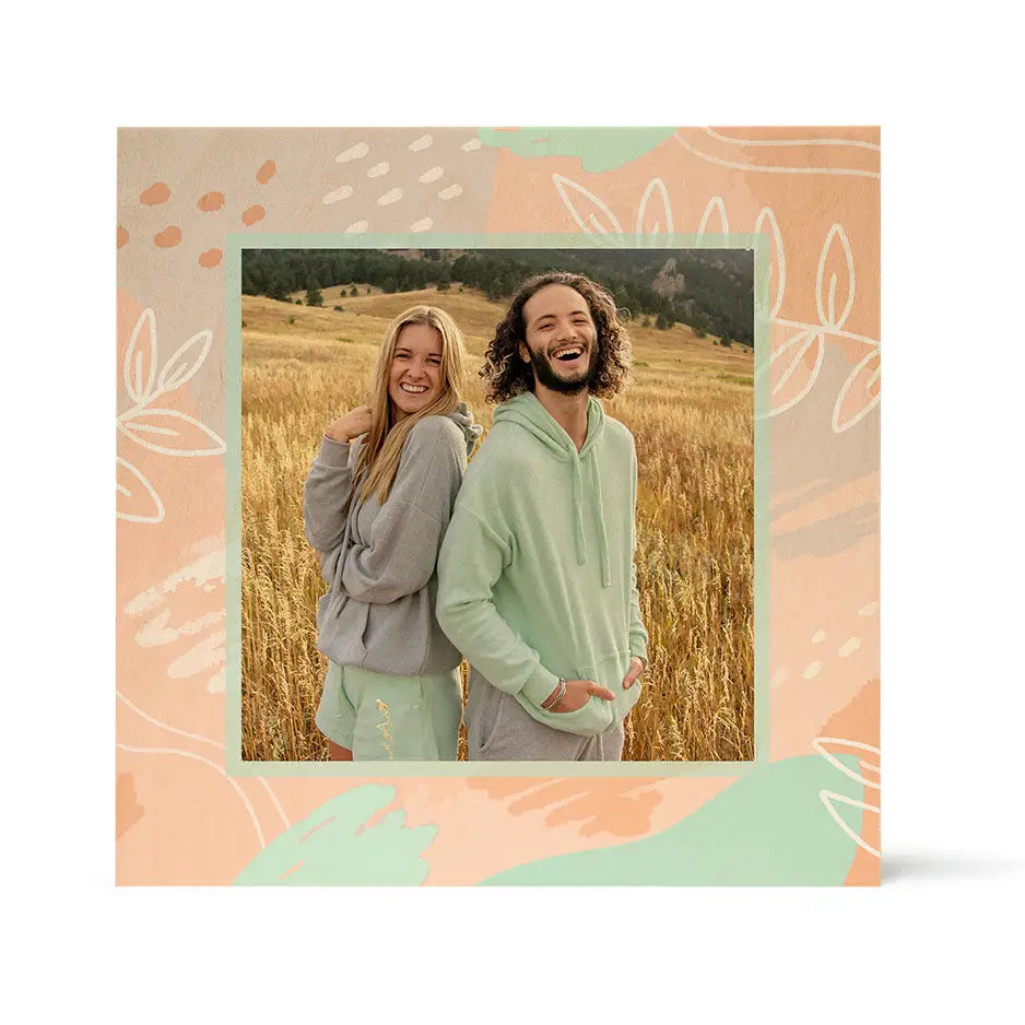 Smiling couple in wheat field with Pattern Wood Print - Fern Sketch border