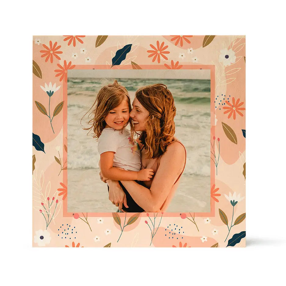 Framed photo of a woman and child on a beach with Spring Floral pattern wood print