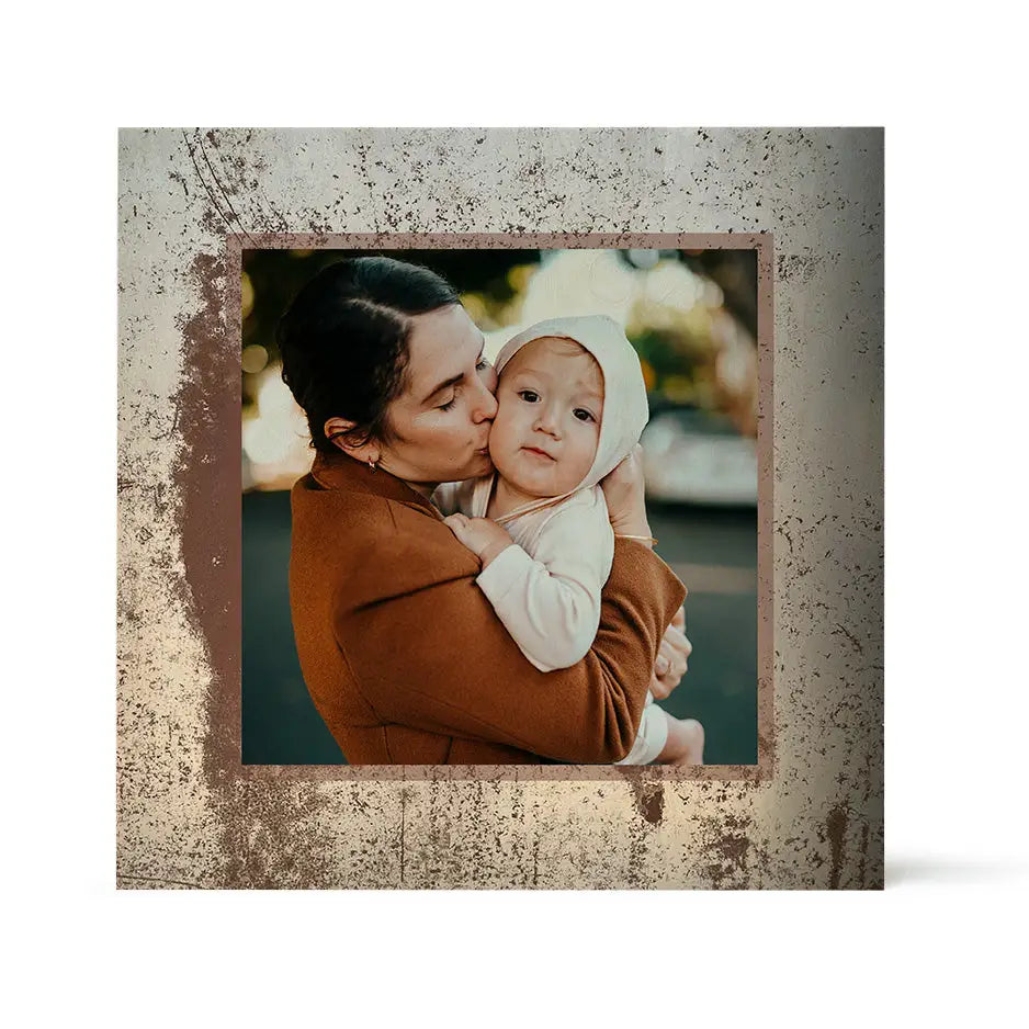 Framed photo locket of a woman holding a baby on a Pattern Wood Print background