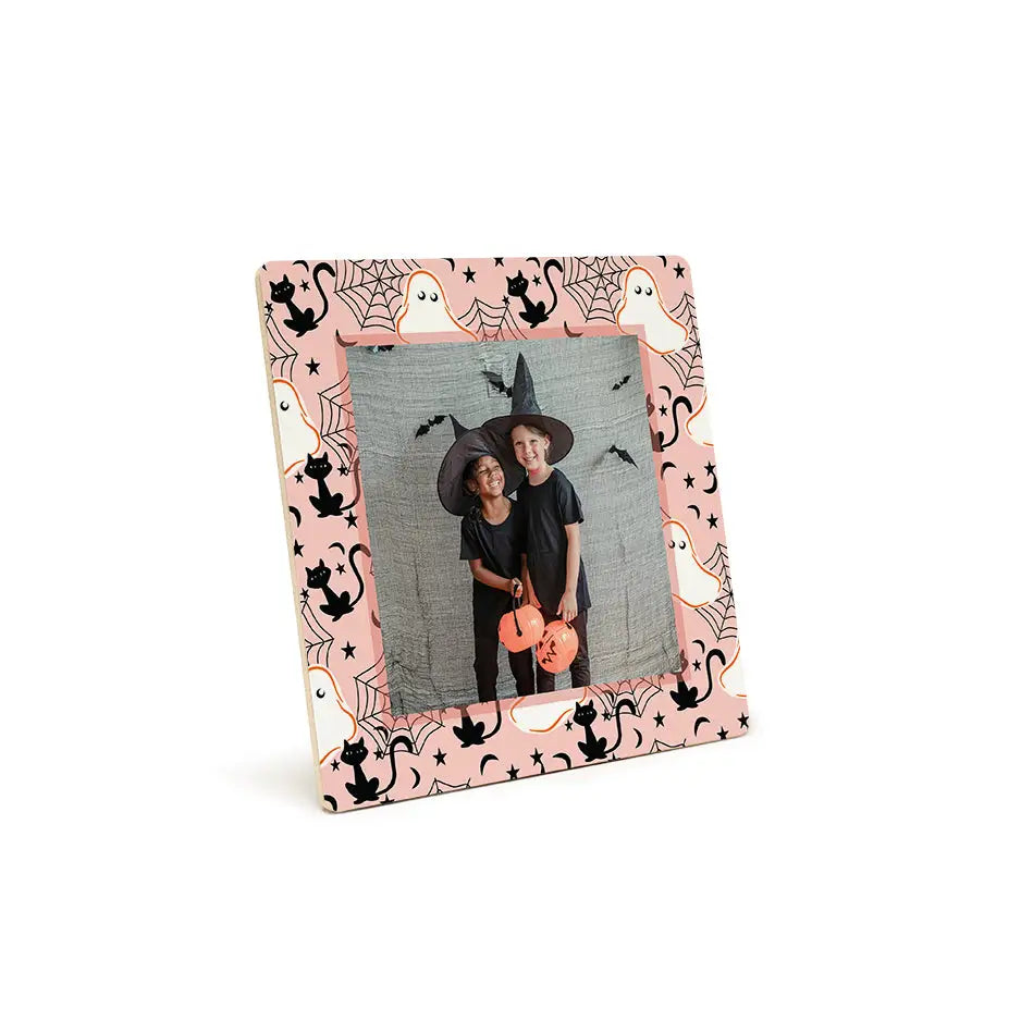 Halloween-themed photo tile pattern frame with cat ghosts, spiderwebs, and black cats