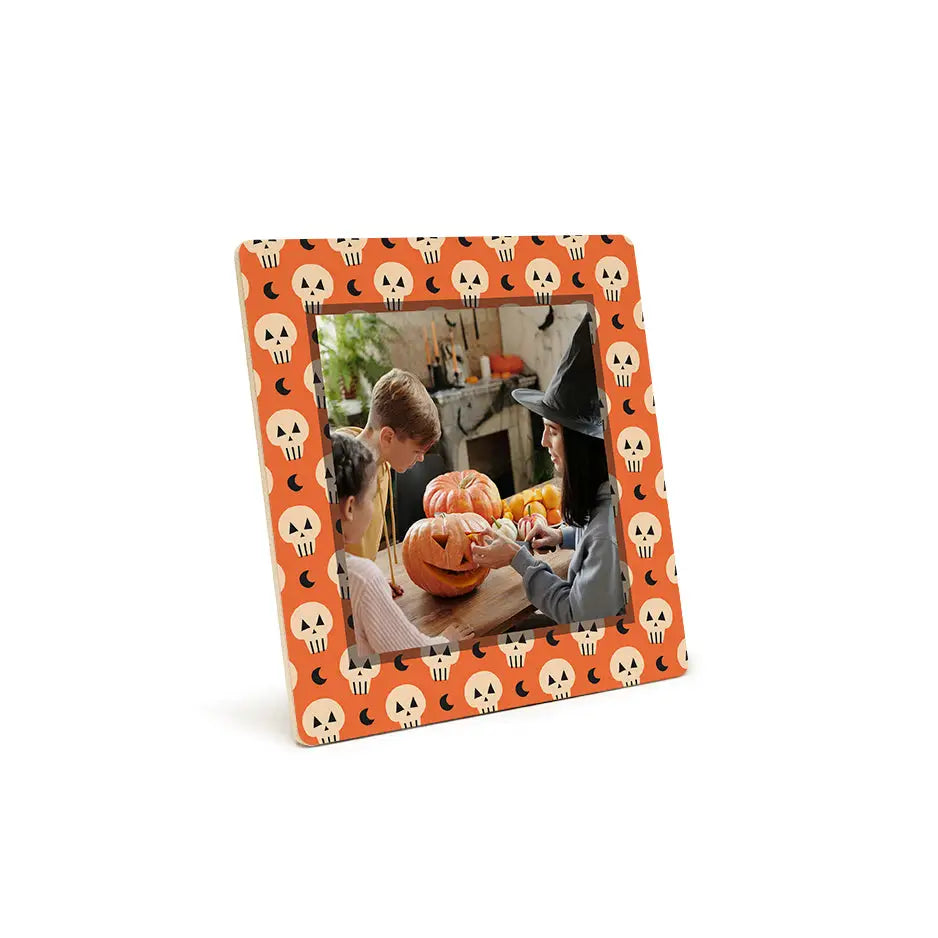 Halloween-themed photo tile pattern featuring skull moon design and carved pumpkin