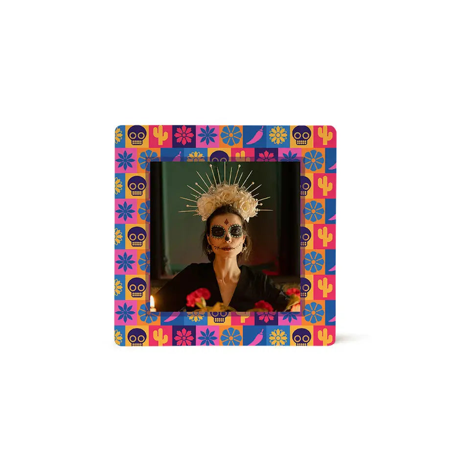 Colorful framed photo of woman with Day of the Dead makeup and golden headdress