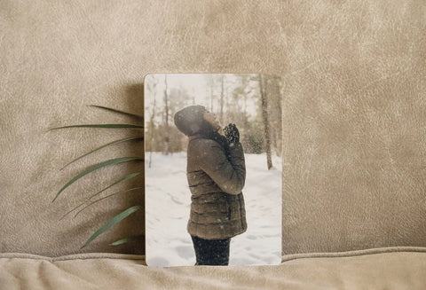 Person in snowy landscape photo tile print, enhancing a vibrant living space.