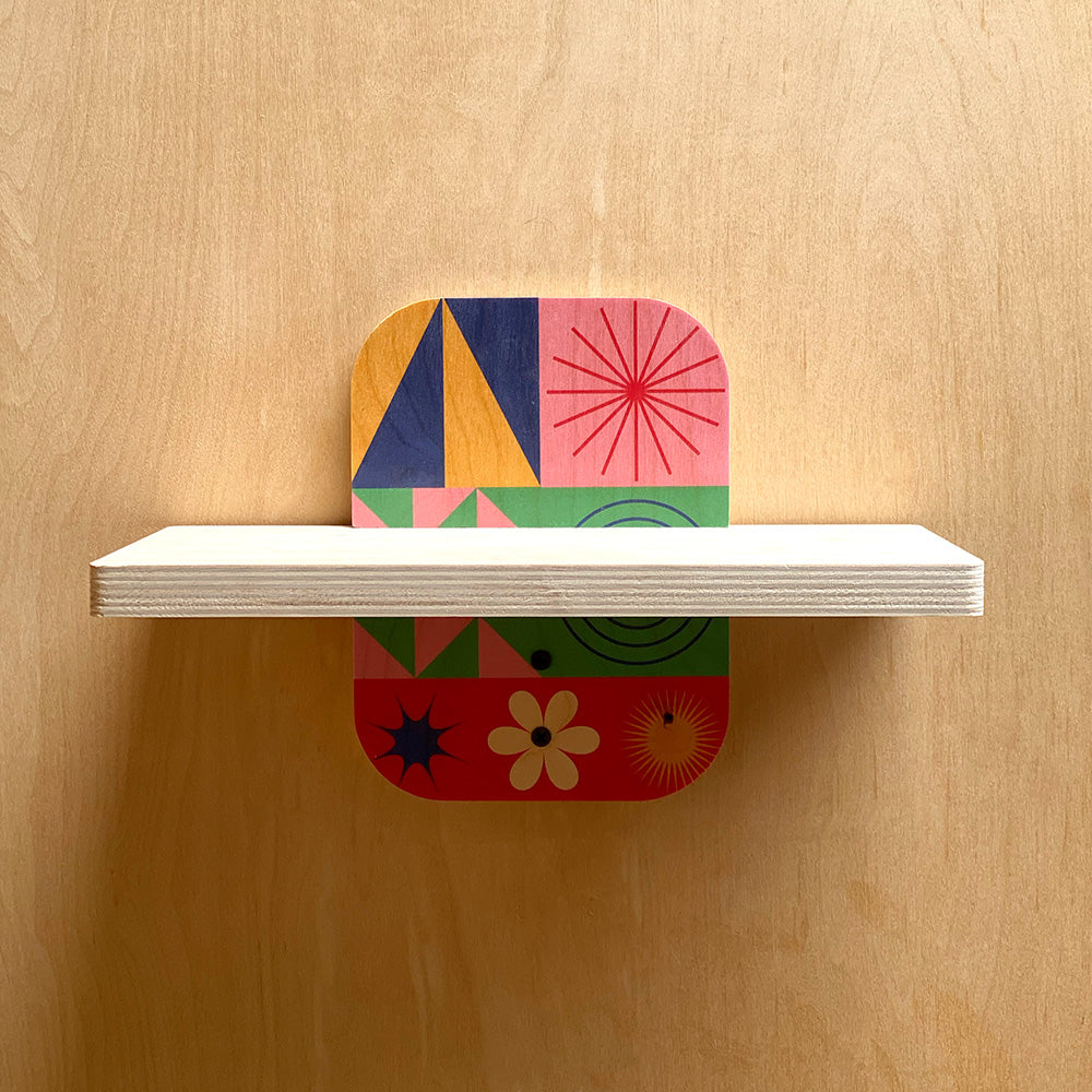 Colorful geometric shelf from Simple and Sturdy Wall Shelves Natural Warmth, a sturdy wall decor