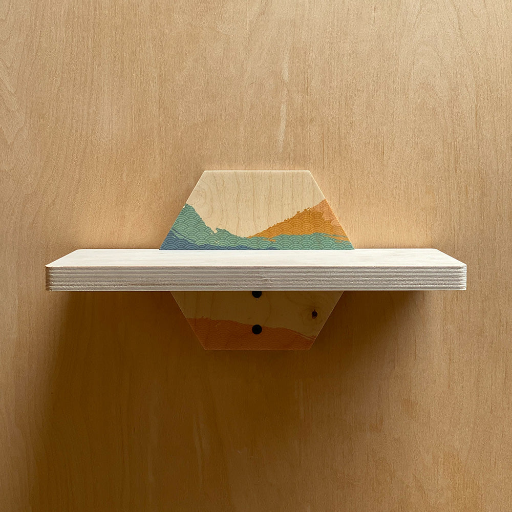 Hexagonal wooden wall shelf with painted landscape, a stylish sturdy wall shelf for your space