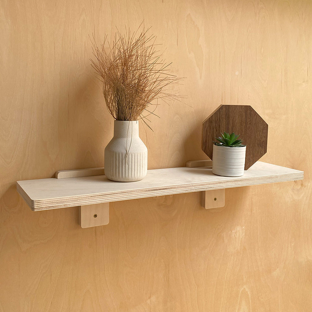 WoodArc Wall Shelf Natural Wood displayed with decorative items on a stylish wood wall shelf