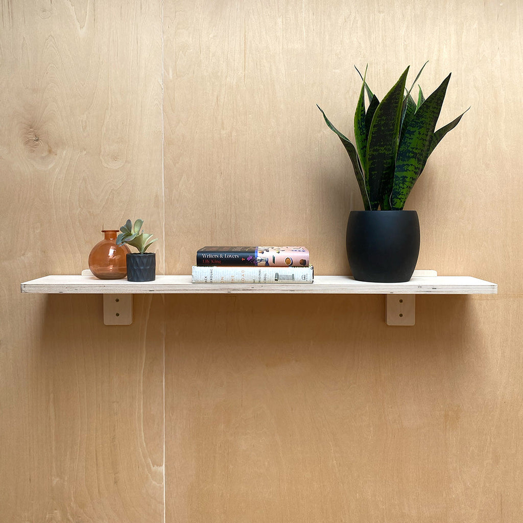 Wall-mounted WoodArc Wall Shelf with decorative items for stylish wood wall shelf decor