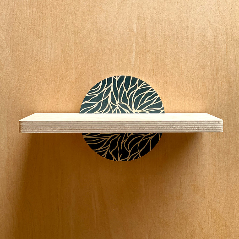Wooden wall shelf with patterned circular support, sturdy wall shelf for decor