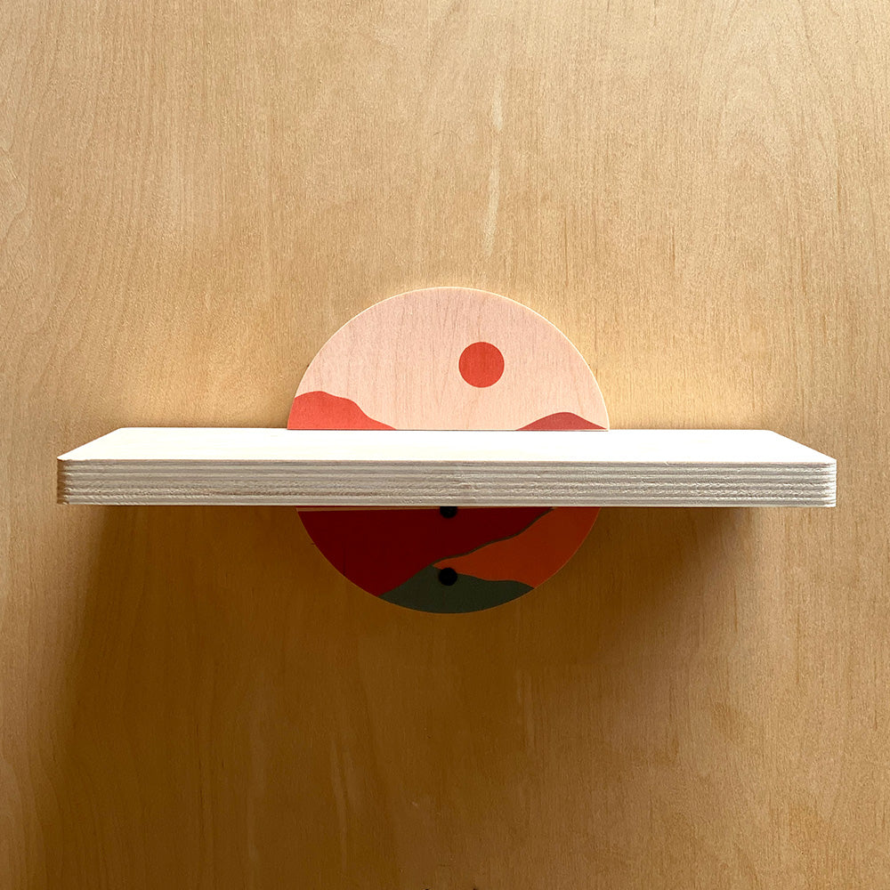 Painted wooden sturdy wall shelf blending everyday function with artistic design