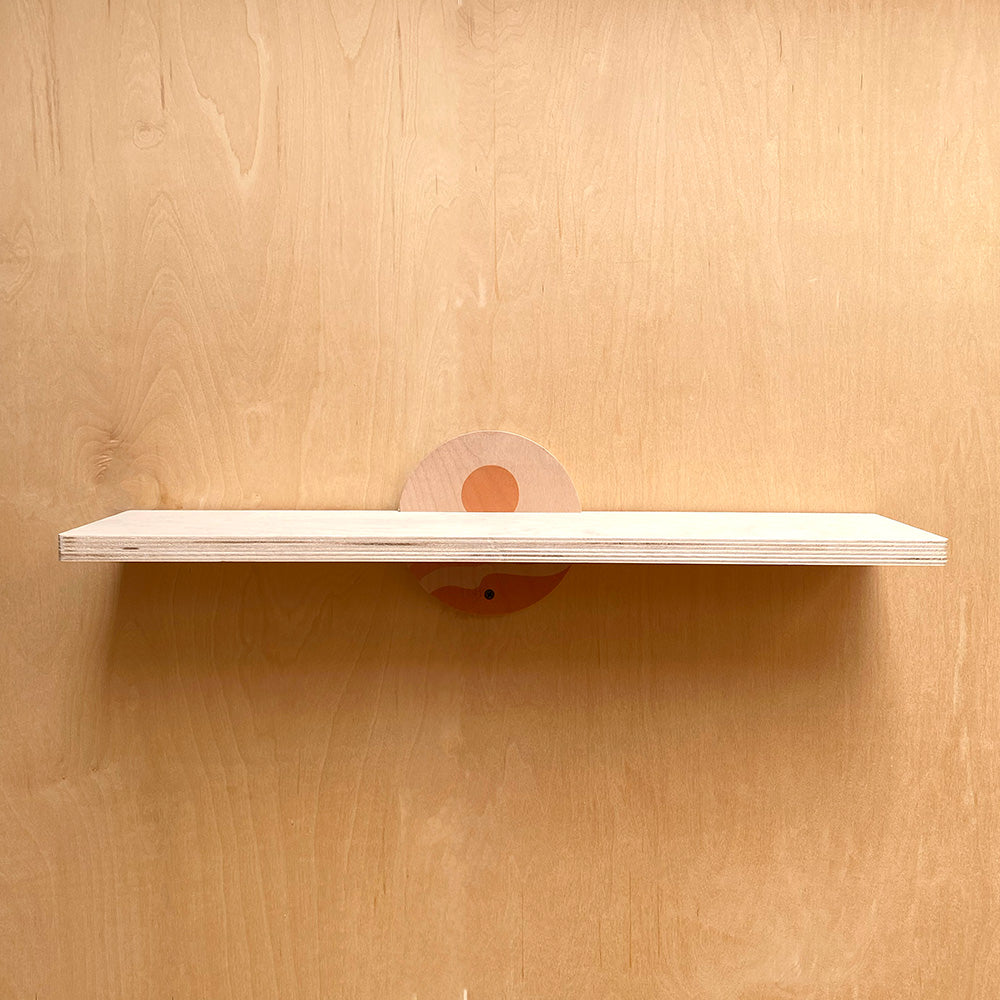 Wooden wall shelf with circular support, part of the Sturdy Wall Shelf for Artistic Home Decor