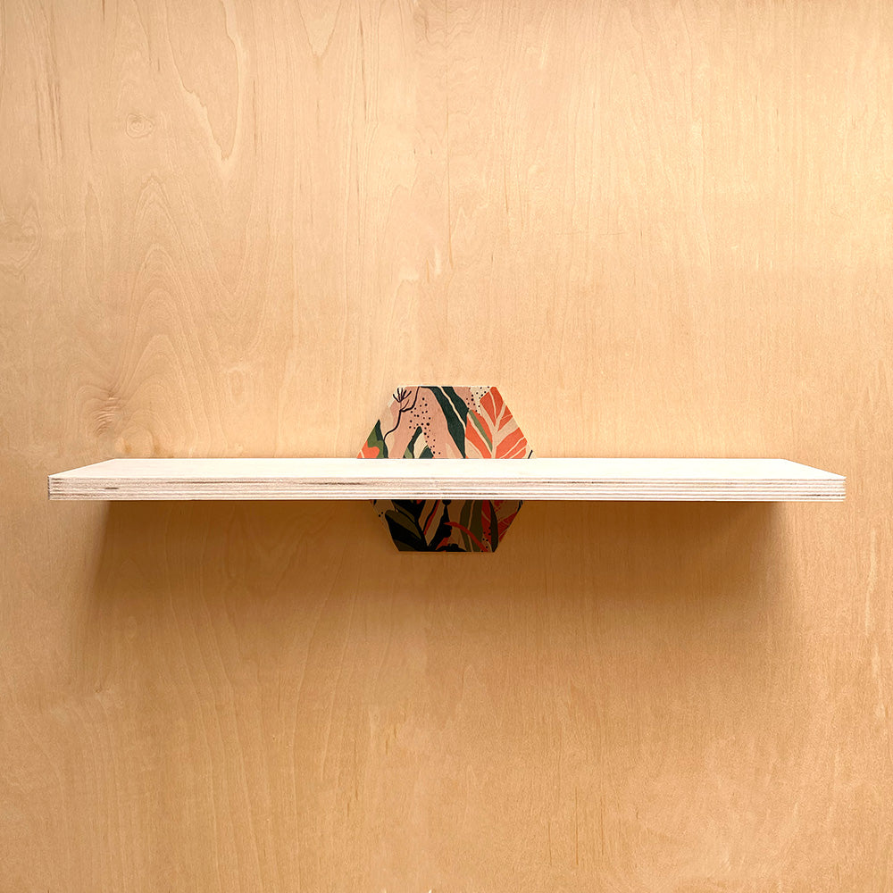 Hexagonal sturdy wall shelf with floral pattern for nature-inspired interiors