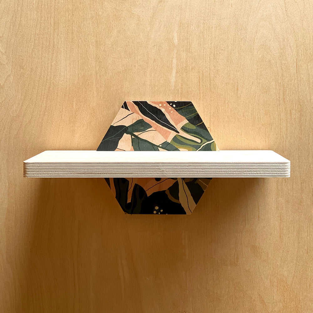 Hexagonal leafy patterned sturdy wall shelf for nature inspired interiors