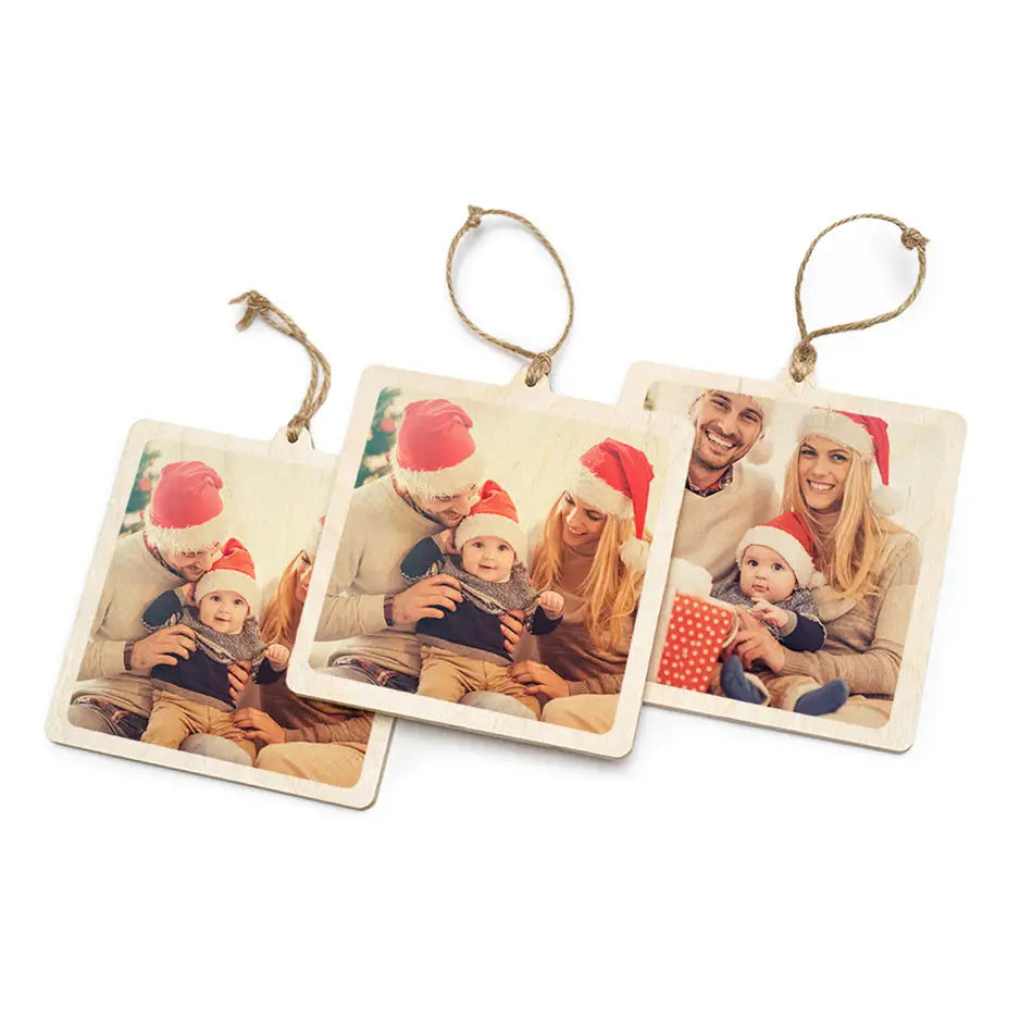 Three matching square wood ornaments with string hangers in a wood ornament set