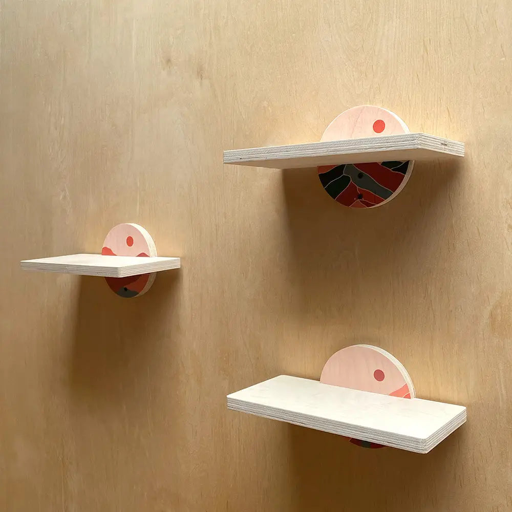 Minimalist wooden wall shelves with circular supports for stylishly maximizing compact spaces