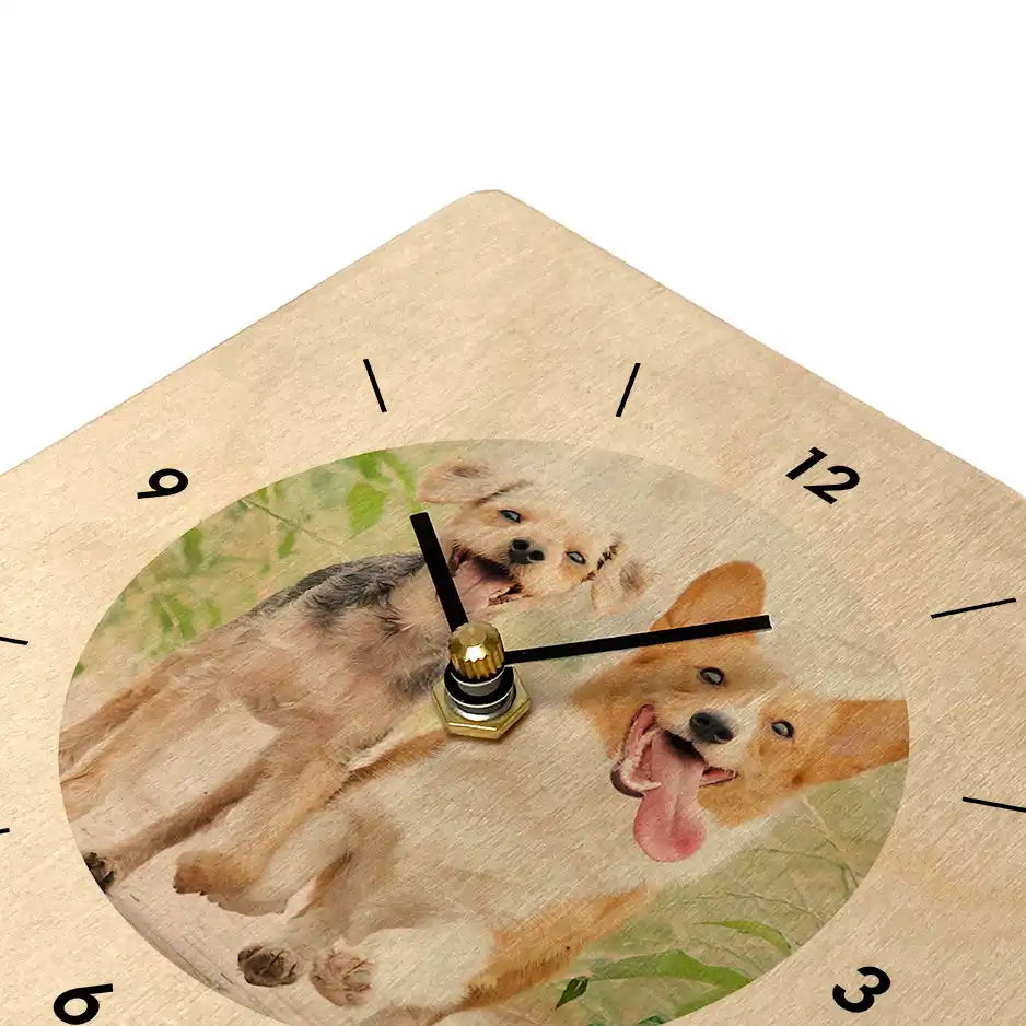 Wall clock featuring two happy dogs in a circular design.